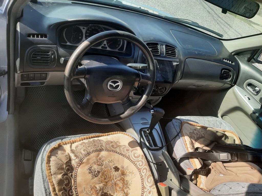 Mazda 323: 2002 г., 1.6 л, Автомат, Бензин, Хэтчбэк: фото 5