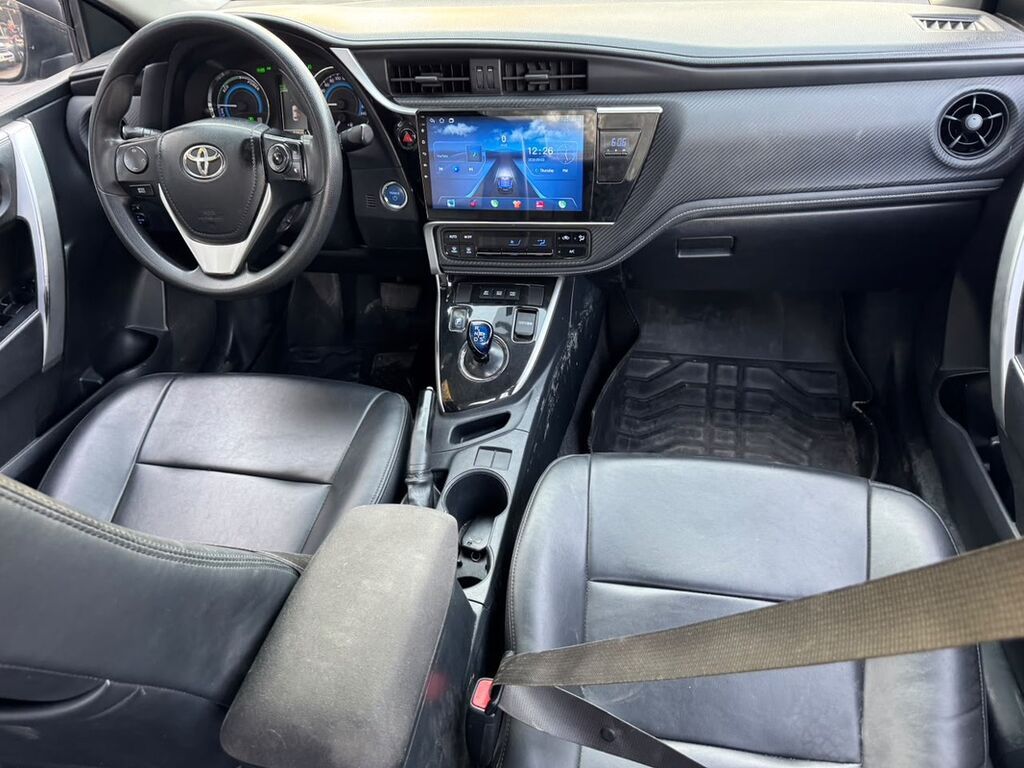 Toyota Corolla: 2019 г., 1.8 л, Вариатор, Гибрид, Седан: фото 2
