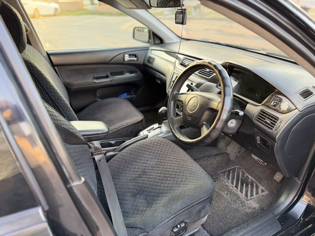 Mitsubishi Lancer: 2001 г., 1.8 л, Вариатор, Бензин, Универсал: фото 8