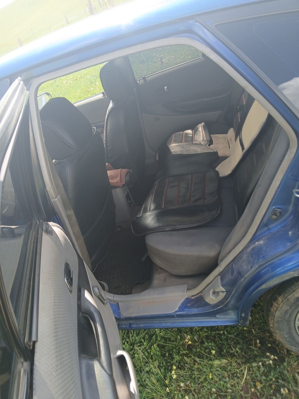 Mazda 323: 2003 г., 1.6 л, Механика, Бензин, Седан: фото 6