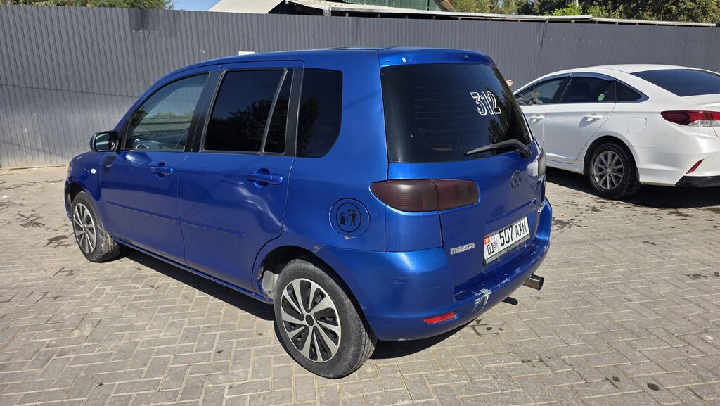 Mazda Demio: 2004 г., 1.3 л, Бензин: фото 8