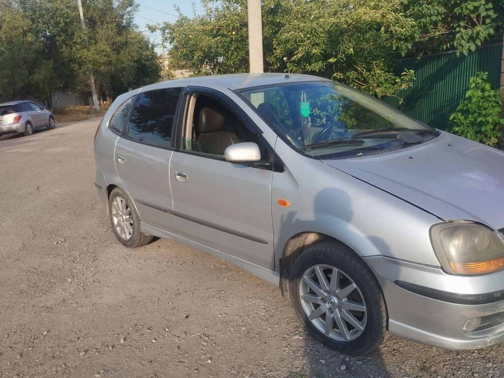 Nissan Almera Tino: 2002 г., 2 л, Вариатор, Бензин, Универсал: фото 2
