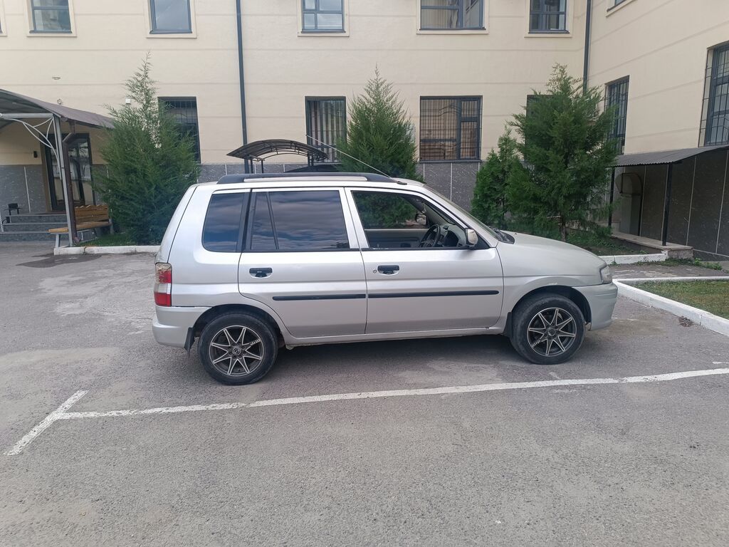 Mazda Demio 1999 г., 1.3 л, автомат: фото 2
