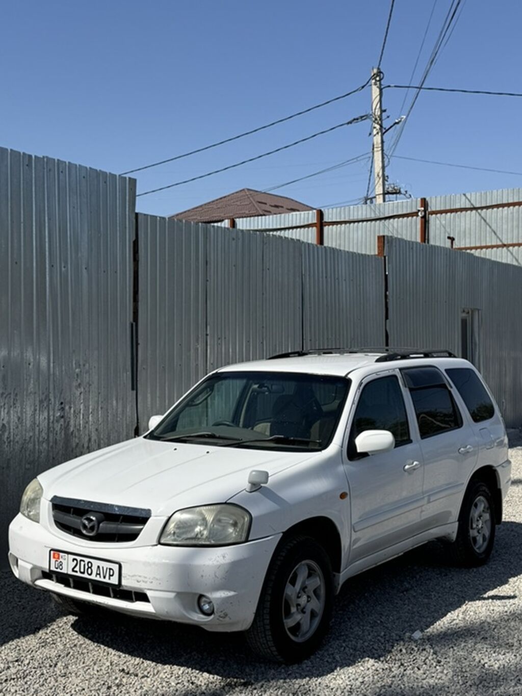 Mazda Tribute: 2002 г., 2 л, Автомат, Газ, Кроссовер: фото 2