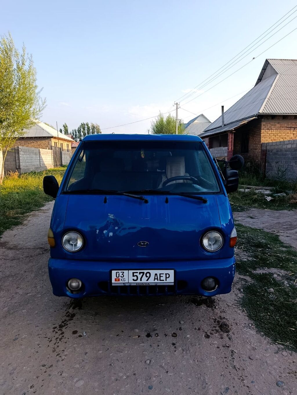 Hyundai Porter (Porter/Porter I) — компактный бортовой грузовик синего: фото 3