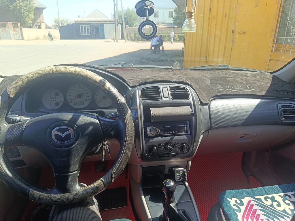 Mazda Familia: 2003 г., 1.5 л, Механика, Бензин, Универсал: фото 4