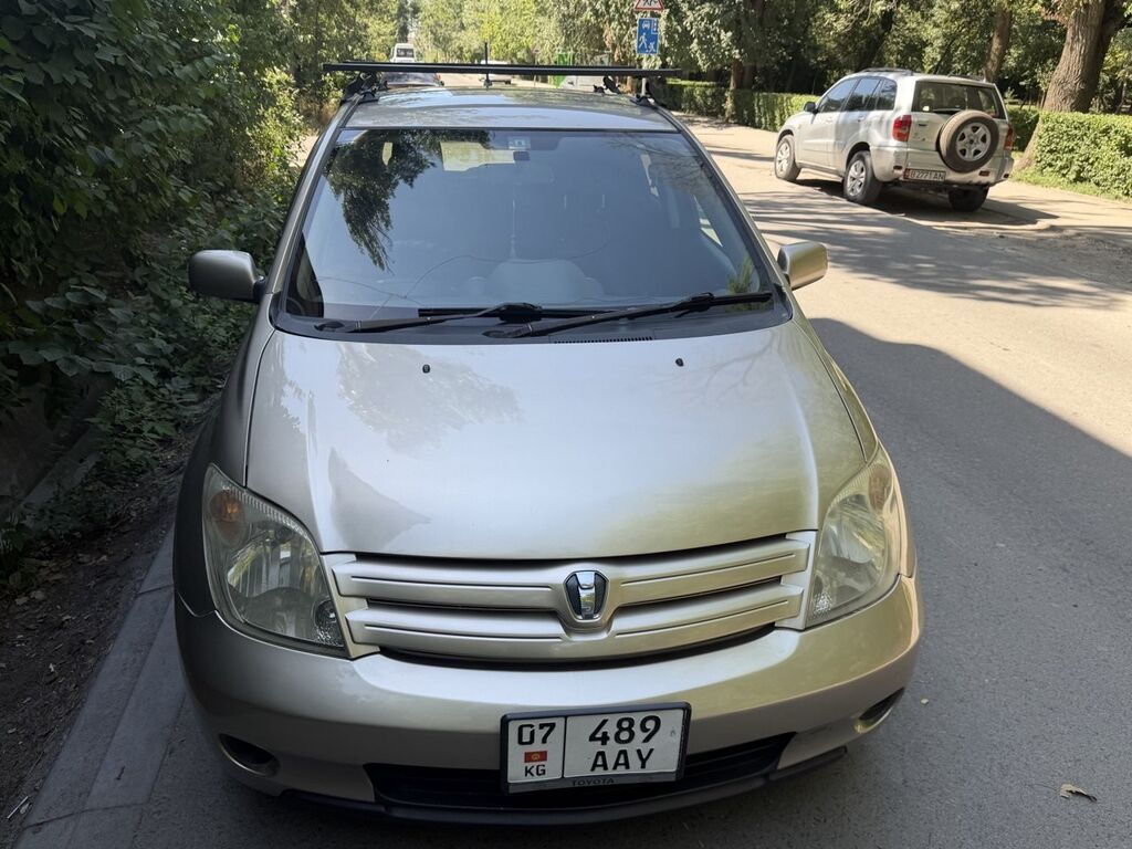 Toyota Ist 2003 г., хэтчбэк: фото 2