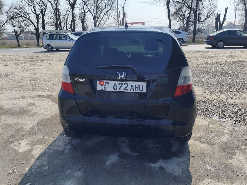 Honda Jazz: 2009 г., 1.4 л, Робот, Бензин, Фастбек: фото 3