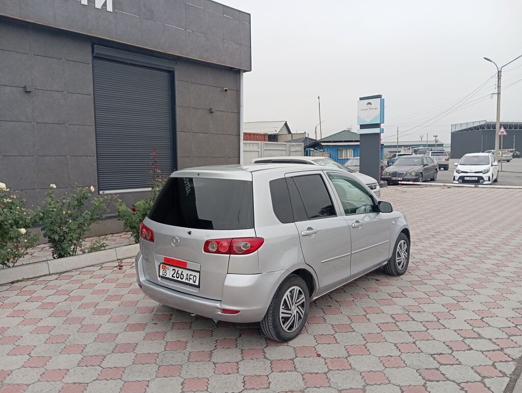 Mazda Demio: 2004 г., 1.5 л, Автомат, Бензин, Хэтчбэк: фото 5