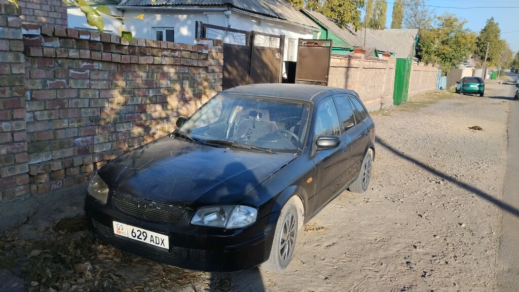 Mazda 323: 2000 г., Механика, Бензин, Универсал: фото 4