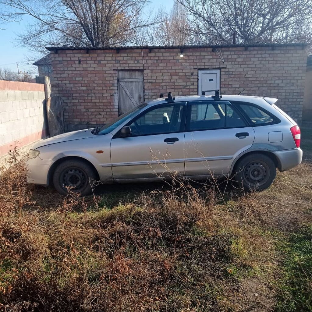 Mazda 323: 2000 г., 1.6 л, Механика, Бензин, Универсал: фото 4