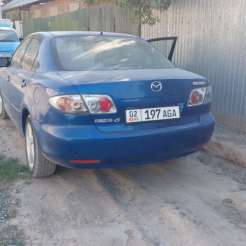 Mazda 6: 2005 г., 1.8 л, Механика, Седан: фото 2