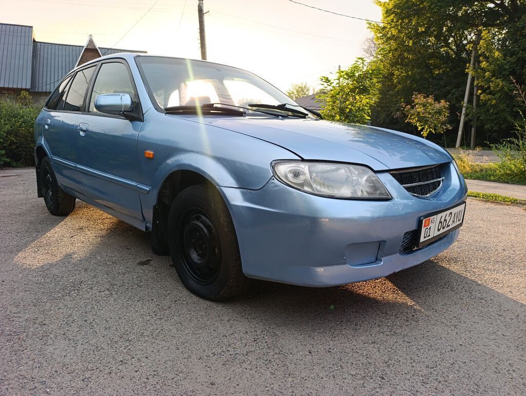Mazda 323: 2003 г., 1.6 л, Механика, Бензин, Универсал: фото 3