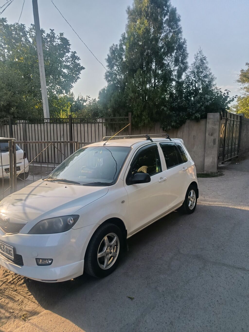 Mazda Demio: 2004 г., 1.3 л, Автомат, Бензин, Хэтчбэк: фото 2
