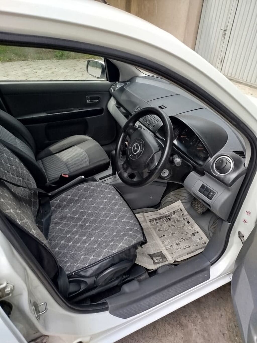 Mazda Demio: 2006 г., Автомат, Универсал: фото 5