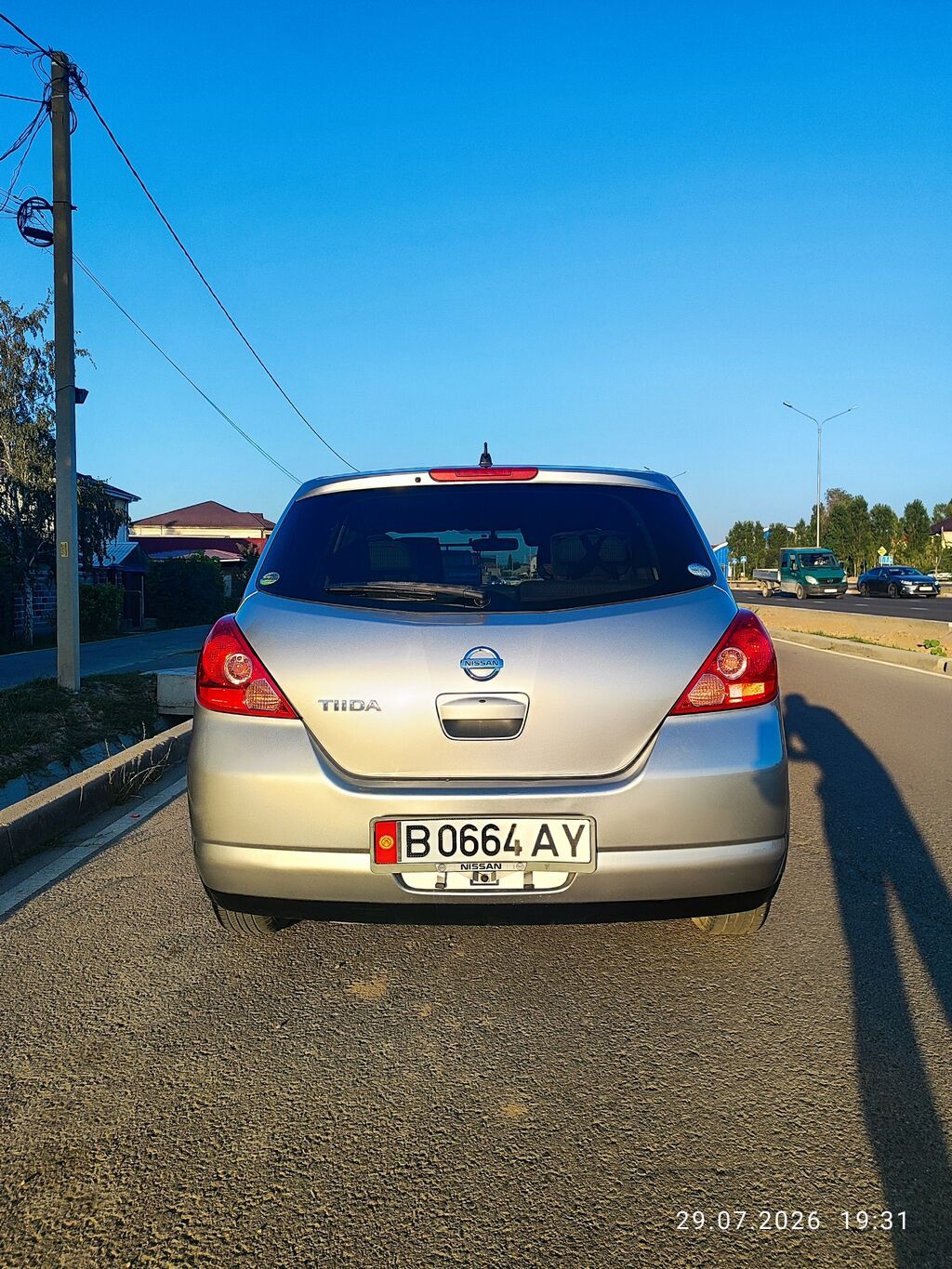 Nissan Tiida: 2005 г., 1.5 л, Вариатор, Бензин, Хэтчбэк: фото 4