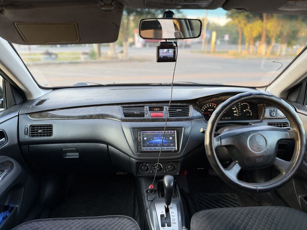 Mitsubishi Lancer: 2001 г., 1.8 л, Вариатор, Бензин, Универсал: фото 8