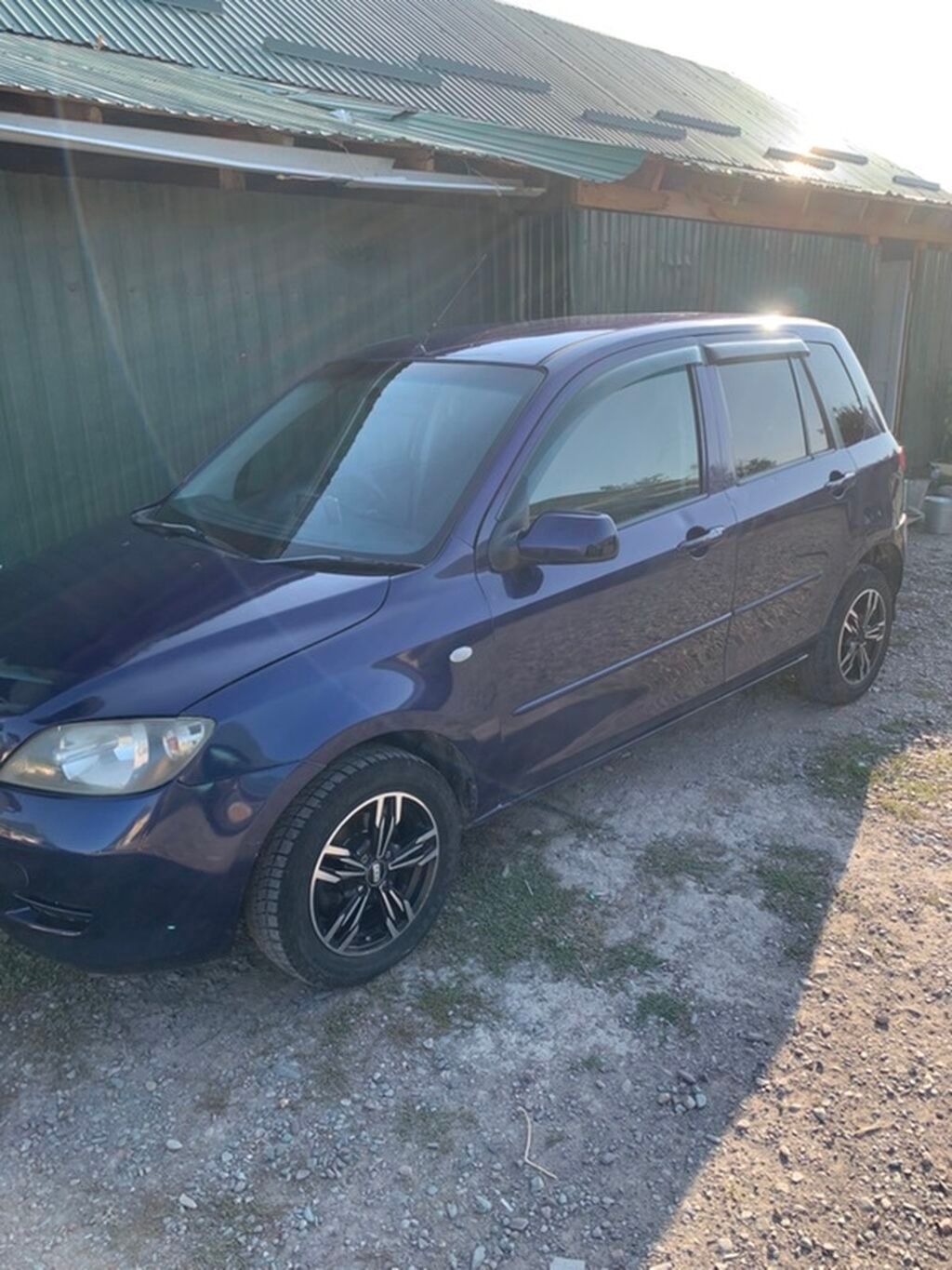 Mazda Demio: 2004 г., 1.3 л, Автомат, Хэтчбэк: фото 2