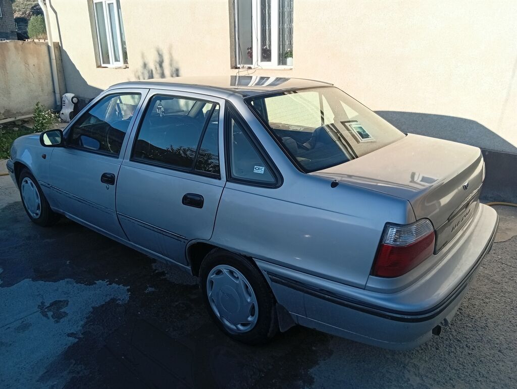 Daewoo Nexia: 2004 г., 1.5 л, Механика, Бензин, Седан: фото 2