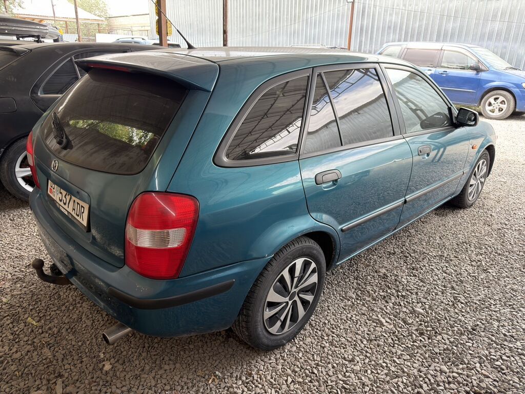 Mazda 323: 1999 г., 1.5 л, Механика, Бензин, Универсал: фото 3