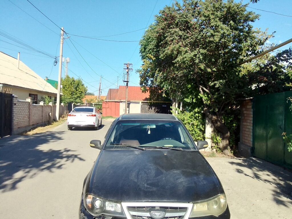 Daewoo Nexia: 2012 г., 1.6 л, Механика, Седан: фото 2