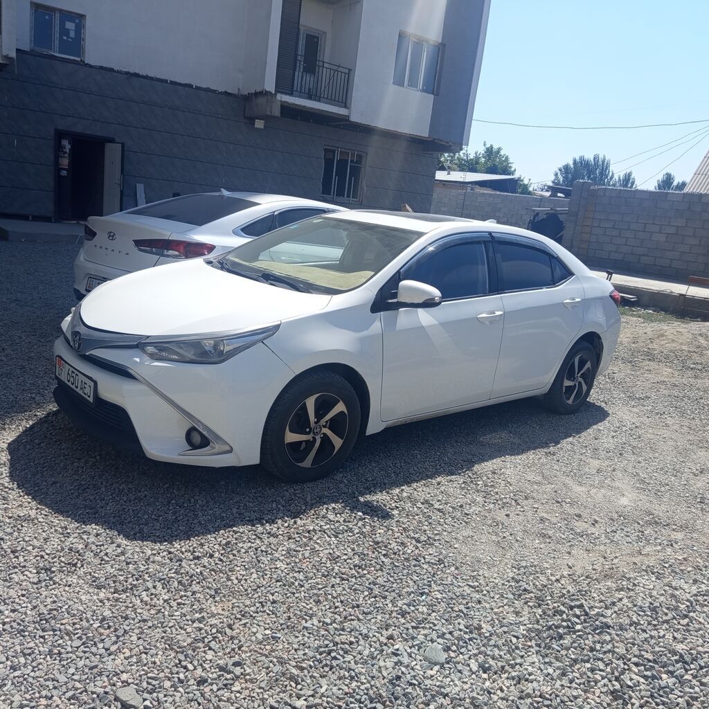 Toyota Corolla: 2017 г., 1.8 л, Автомат, Гибрид, Седан: фото 2