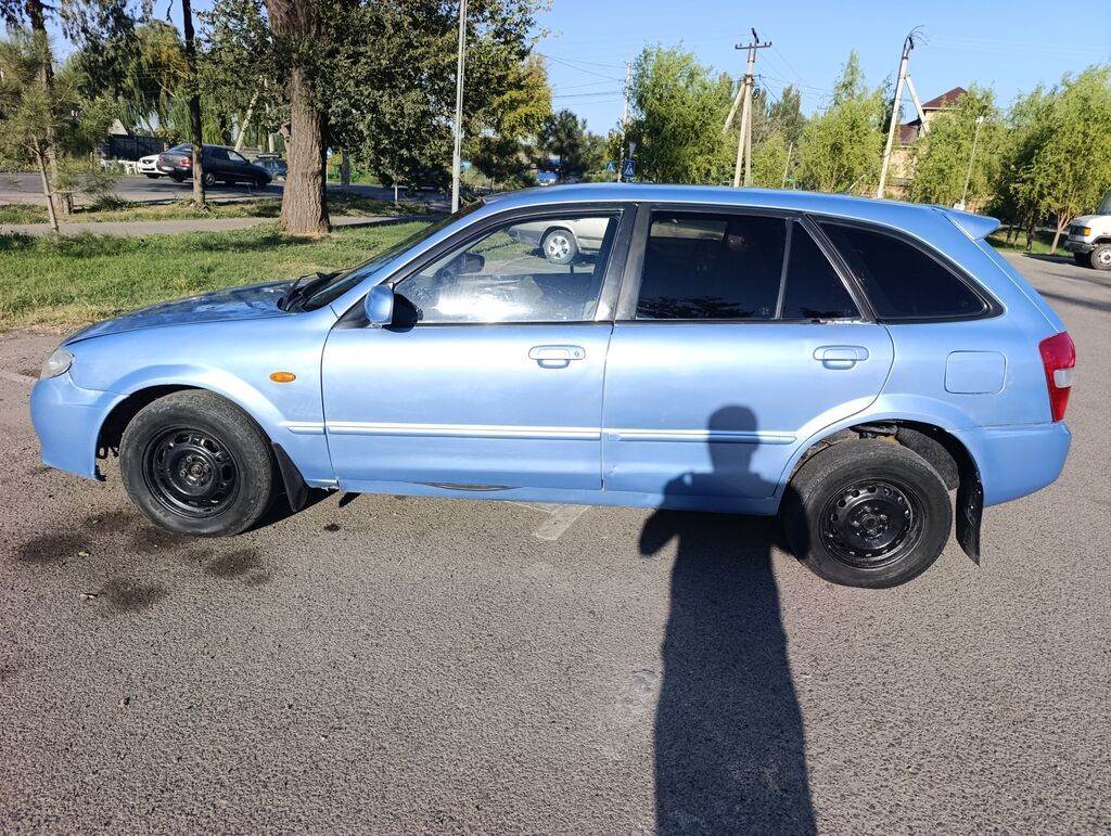 Mazda 323: 2003 г., 1.6 л, Механика, Бензин, Универсал: фото 6