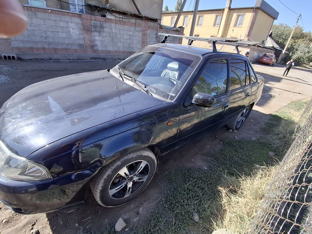 Daewoo Nexia: 2009 г., 1.5 л, Механика, Бензин, Седан: фото 3