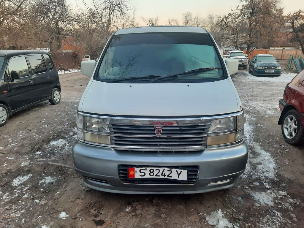 Ниссан бишкеке. Nissan Elgrand 1999. Ниссан Караван Эльгранд 1998. Ниссан Homy Elgrand. Ниссан Эльгранд 1999.