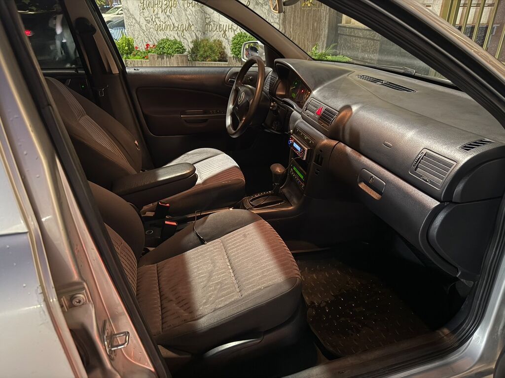 Skoda Octavia: 2003 г., 2 л, Автомат, Газ, Универсал: фото 6