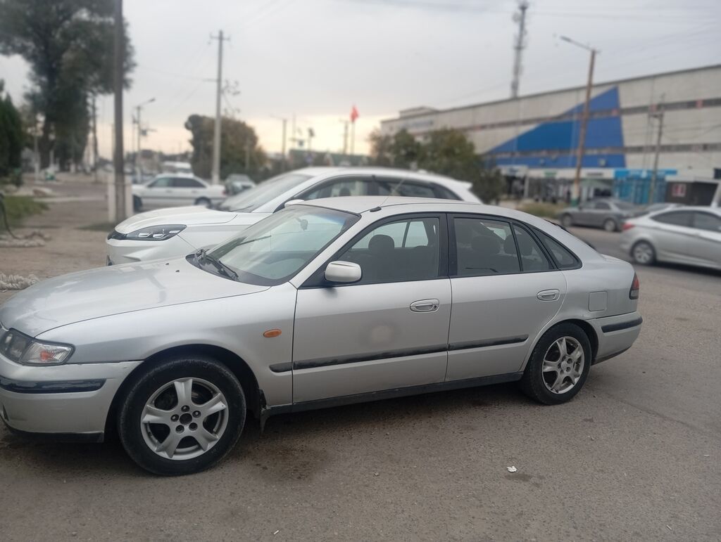Срочно продам Mazda 626, 1998 г., 2 л, механика: фото 2
