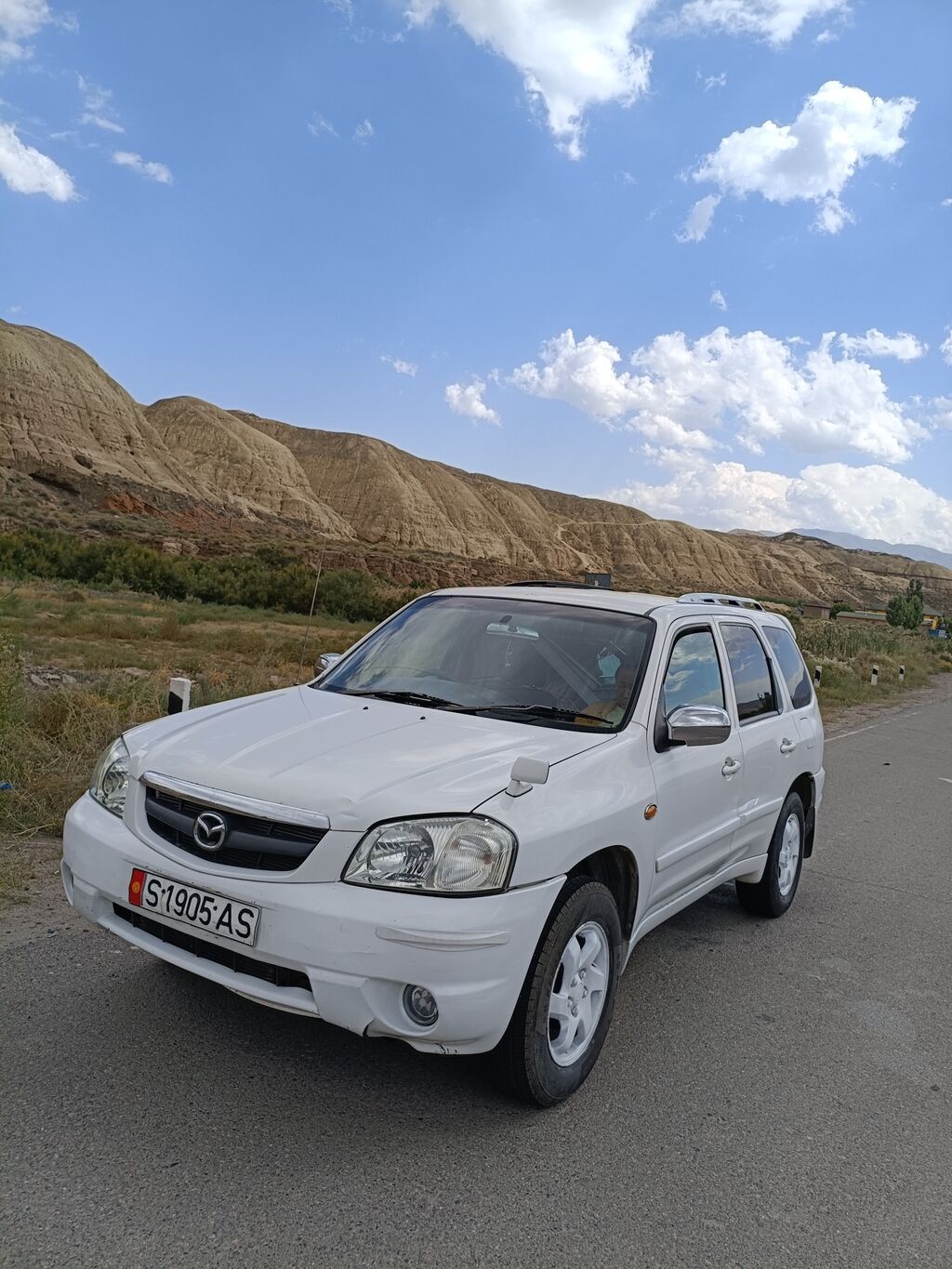Mazda Tribute: 2002 г., 2 л, Автомат, Бензин, Кроссовер: фото 2