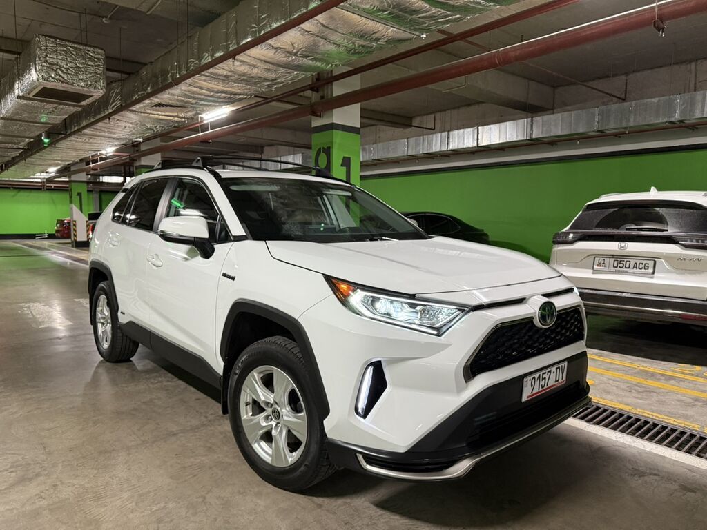 Toyota RAV4: 2021 г., 2.5 л, Автомат, Гибрид, Кроссовер: фото 1
