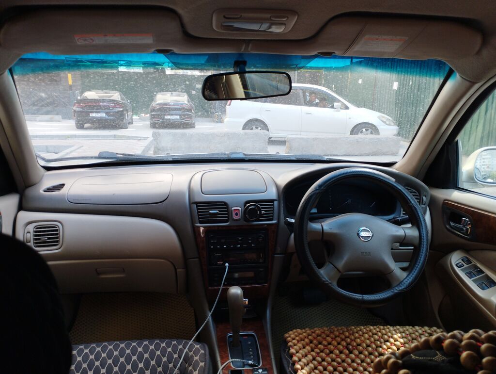Nissan Sunny: 2004 г., Автомат, Бензин, Седан: фото 3
