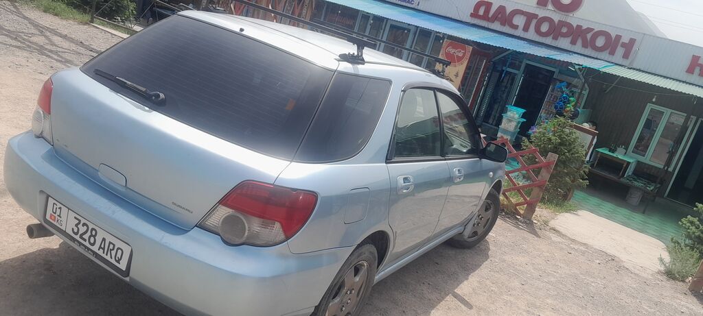 Subaru Impreza: 2004 г., Бензин, Универсал: фото 2