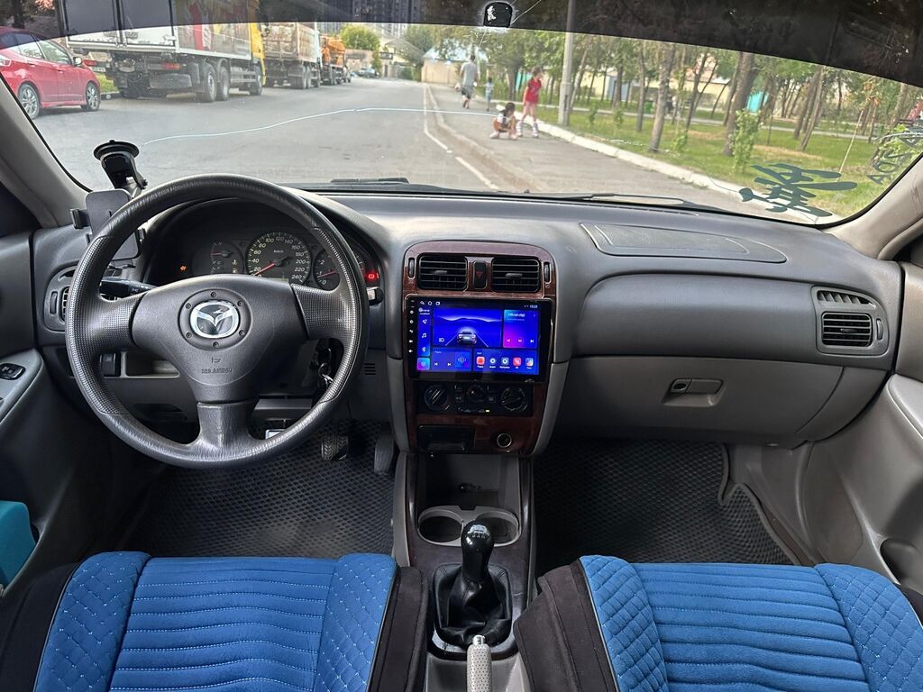 Mazda Capella: 2000 г., 1.8 л, Механика, Бензин, Хэтчбэк: фото 6