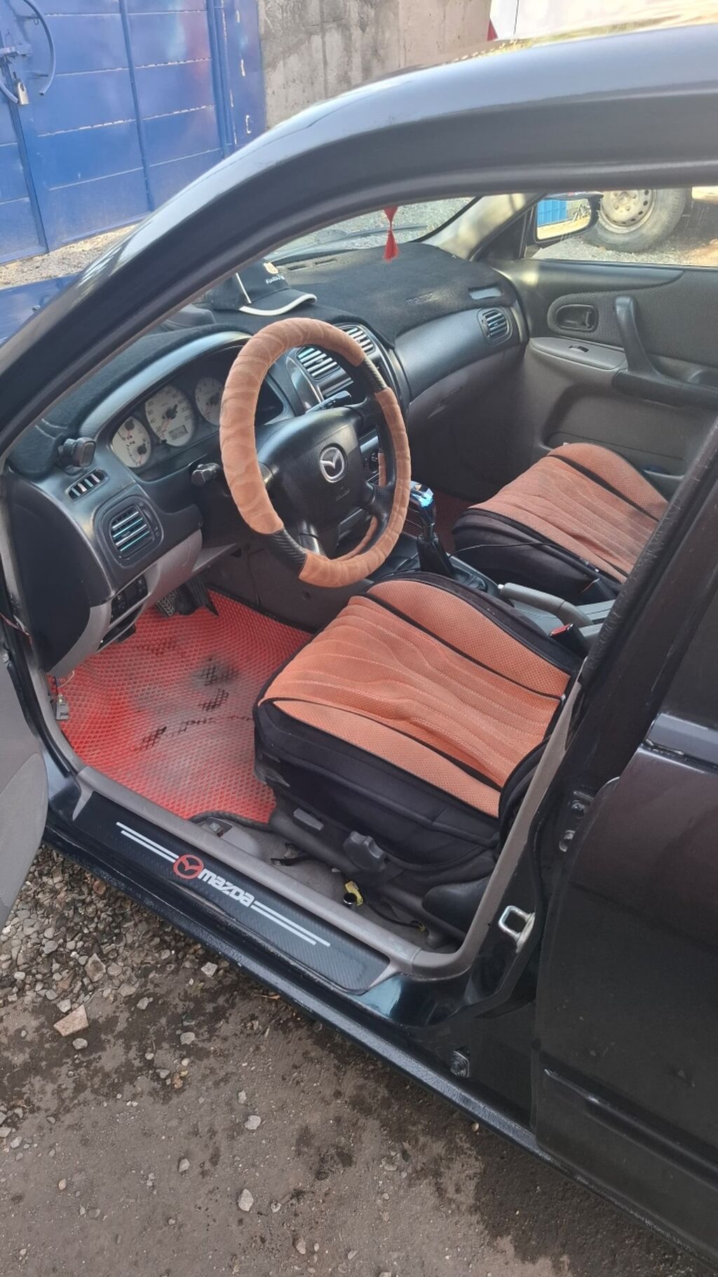 Mazda 323: 2002 г., 1.6 л, Механика, Бензин, Универсал: фото 4