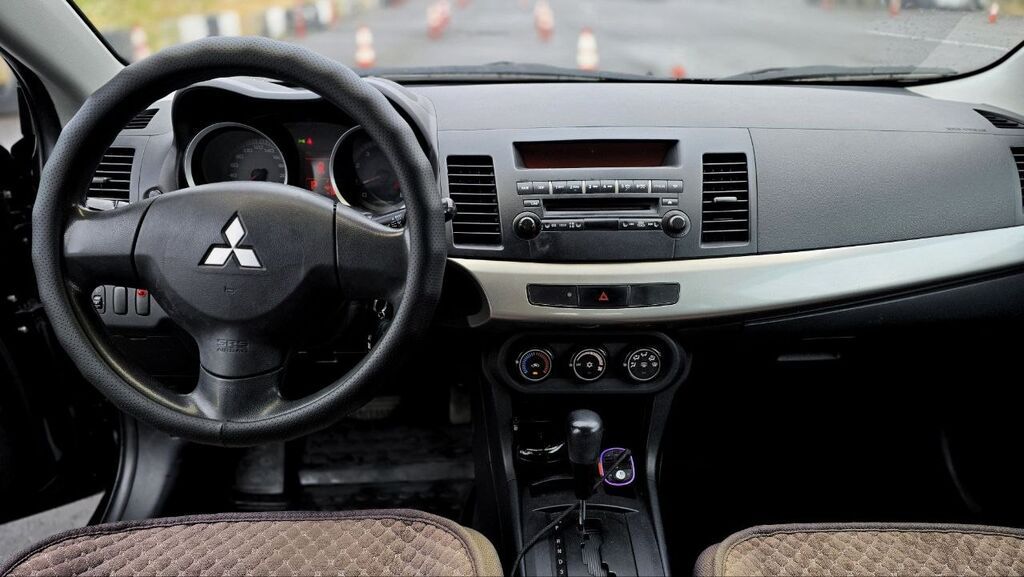 Mitsubishi Lancer: 2007 г., 1.5 л, Автомат, Бензин, Седан: фото 7