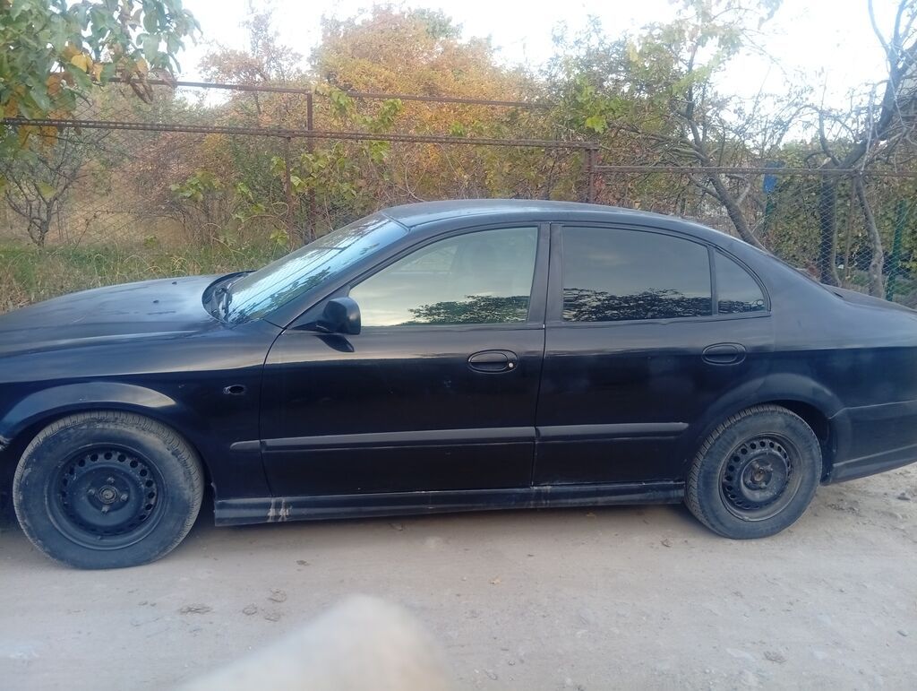 Chevrolet Epica, 2005 г., 2 л, автомат, седан: фото 2