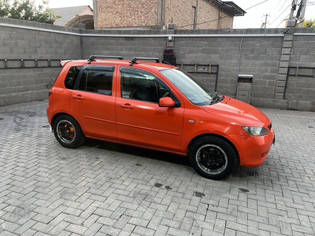 Mazda Demio: 2003 г., 1.3 л, Автомат, Бензин, Хэтчбэк — фото 2