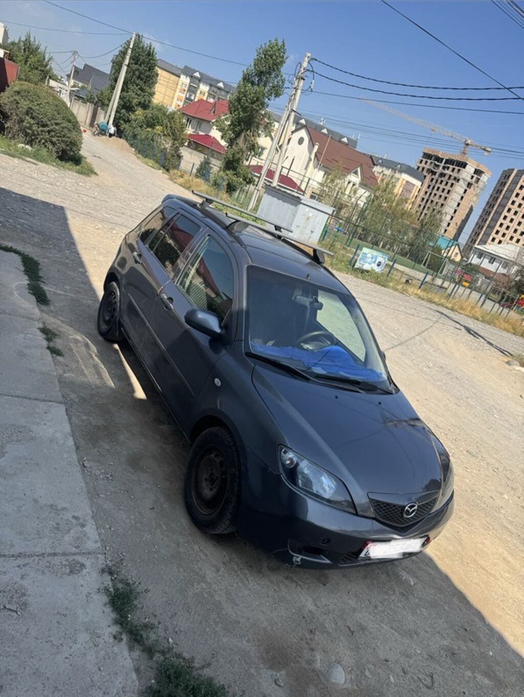 Mazda Demio: 2003 г., 1.3 л, Механика, Бензин, Хэтчбэк: фото 2