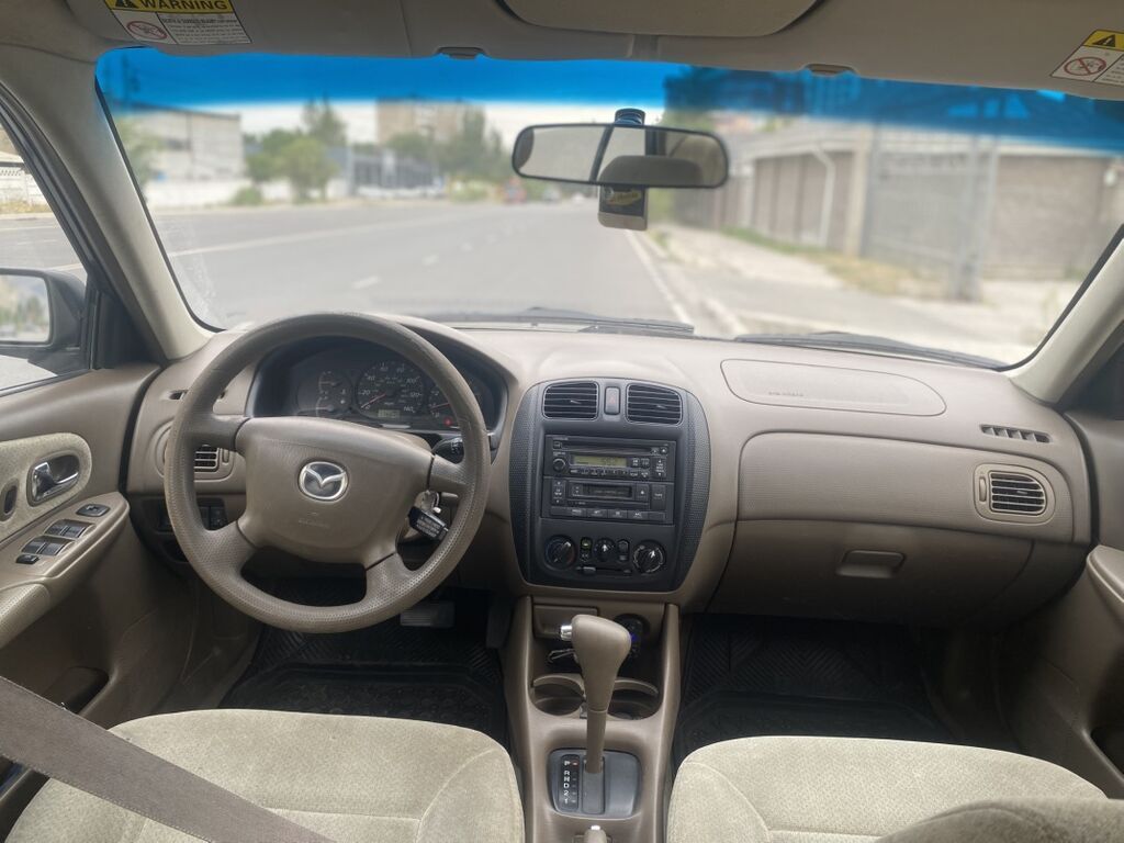 Mazda Protege: 2000 г., 1.6 л, Автомат, Бензин, Седан: фото 4