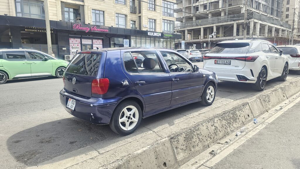Volkswagen Polo: 2000 г., 1.4 л, Автомат, Бензин, Хэтчбэк: фото 2