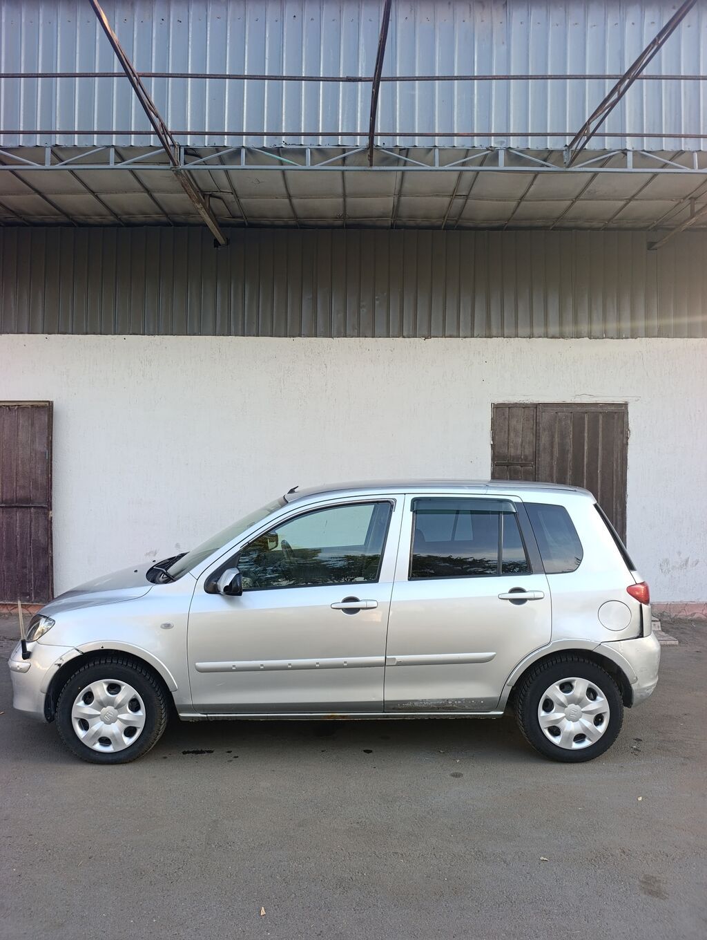 Mazda Demio: 2003 г., 1.3 л, Автомат, Бензин, Хэтчбэк: фото 5