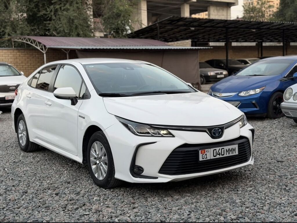 Toyota Corolla: 2022 г., 1.8 л, Автомат, Гибрид, Седан: фото 3