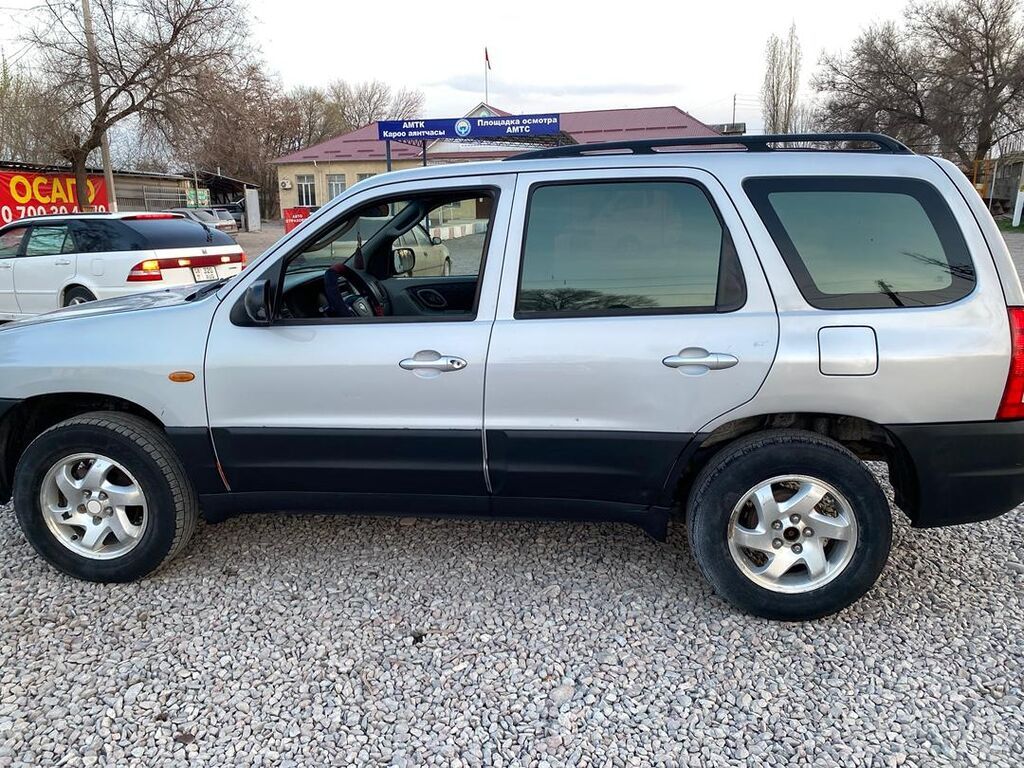Mazda Tribute: 2002 г., 2 л, Механика, Бензин, Кроссовер: фото 4