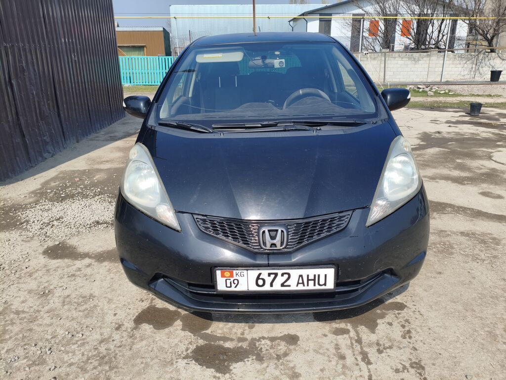 Honda Jazz: 2009 г., 1.4 л, Робот, Бензин, Фастбек: фото 2
