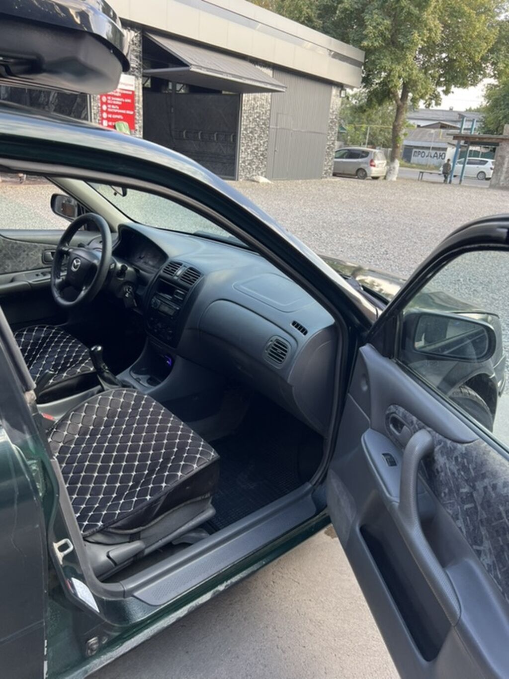 Mazda 323: 1999 г., 1.6 л, Механика, Бензин, Универсал: фото 7