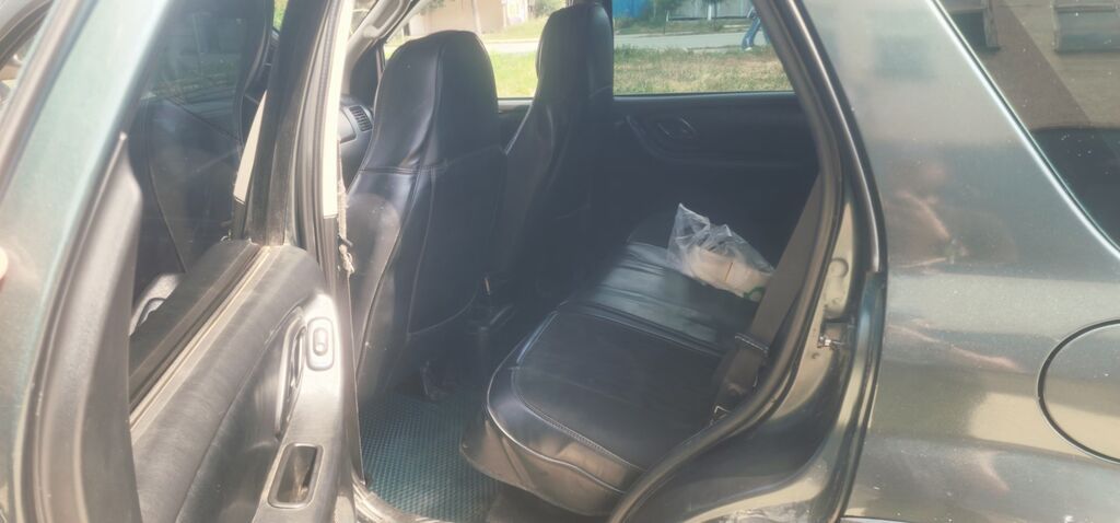 Ford Maverick: 2003 г., 2 л, Механика, Бензин, Внедорожник: фото 5