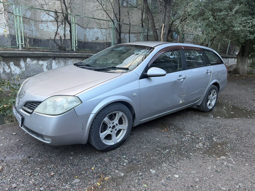 Nissan Primera: 2001 г., 2 л, Бензин, Универсал: фото 2